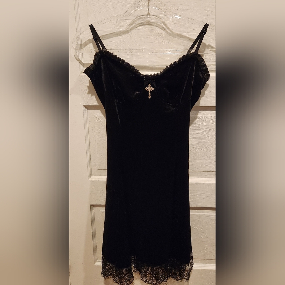 Black Dress with silver cross detail and lace trim. Size L.